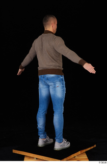 Arnost blue jeans brown sweatshirt clothing standing whole body 0014.jpg